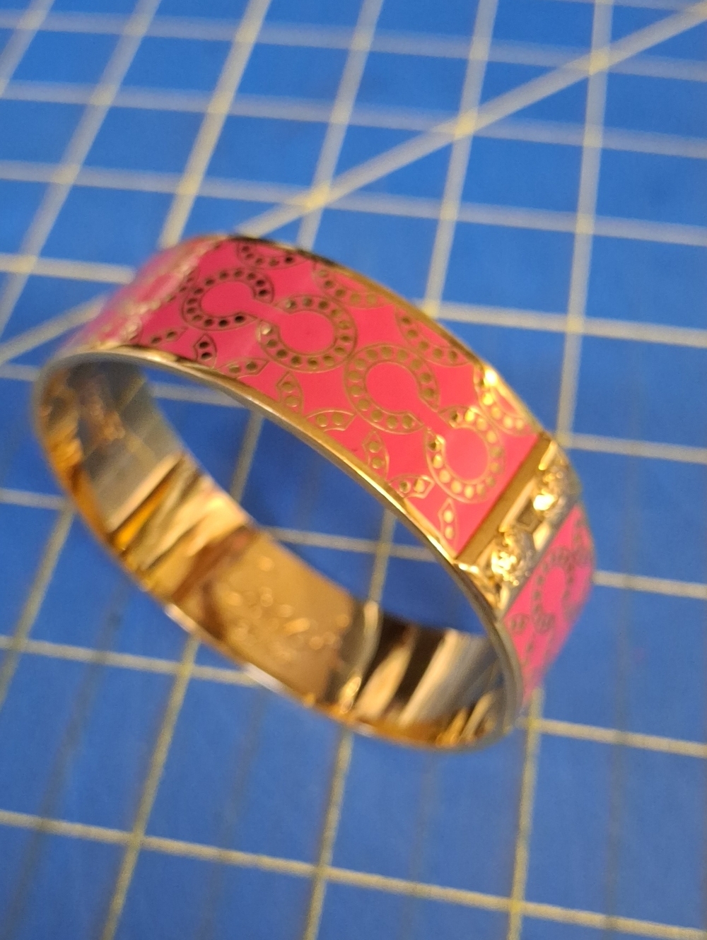 Coach Gold-Tone Pink Enamel Hinged Bangle Bracelet